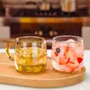 Venta al por mayor de fábrica taza de café de vidrio con asa estilo nórdico taza de leche taza de barriga grande taza transparente para avena desayuno