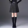 Falda plisada de cintura alta que cubre la cadera, nueva colección otoño/invierno 2026 para mujer, mezcla de lana, la falda corta de moda y versátil de este año