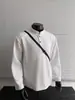 Camiseta Henley de Manga Larga Nueva de Moda Primavera/Otoño 2026 para Hombre, Corte Holgado, Casual, Color Sólido, Top de Moda Versátil