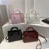 Bolso de mano pequeño cuadrado de moda estilo coreano para mujer, nueva colección de verano 2026, color liso, diseño simple, bolso de hombro y bolso cruzado para ir al trabajo