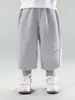 Otoño 2026 Nuevo Estilo Versión Coreana Versátil para Niños Pantalones Deportivos Casuales con Letras Sueltos Primavera y Otoño Pantalones Deportivos para Niños