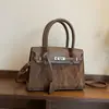 Bolsos de Diseño de Nicho para Mujer 2026 Nuevo Bolso Cruzado de Verano Estilo Coreano Bolso de Mano Informal Bolso Kelly Platino
