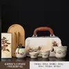 Juego de té de estilo chino cultural y creativo, completo con una tetera, tres tazas y un recipiente para té, empaquetado en una caja de regalo de Dunhuang, adecuado como regalo o recuerdo