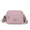 2026 Nova Bolsa Feminina de Cor Sólida Tendência Moda Cor Sólida Ombro Único Transversal Simples Bolsa Feminina de Nylon Casual Pequena Quadrada