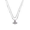 Collar de plata rota con amor Saturno de circón microincrustado para mujer, doble cadena apilada en la clavícula, cadena para suéter de lujo ligero de alta gama para mujer
