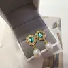 Nuevos pendientes de mujer de moda para comercio electrónico transfronterizo europeo y americano: perla natural, moda vintage popular, aretes creativos para dama