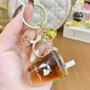Chaveiro de Garrafa de Areia Líquida Estilo Americano Laranja Luckin C Preenchido com Óleo Acrílico, Chaveiro Popular de Xícara de Café para Homens e Mulheres