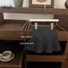 Traje estilo Academia para niñas Primavera y Verano 2025 Camisa Polo de Punto de Manga Corta Estilo Occidental para Bebé Niña Falda Corta Plisada Vestido de Verano