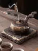 Bandeja para tetera Sutra del Corazón estilo japonés de hierro esmaltado dorado pequeña bandeja de gres con depósito de agua plataforma de preparación en seco alfombrilla para tetera soporte para tetera bandeja de té