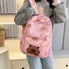 Mochila de Grande Capacidade 2026 Novo Estilo Fashionável e Estilosa Bolsa Escolar para Alunos do Ensino Médio Mochila Casual Infantil e Fofa para Homens e Mulheres