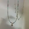 Collar con colgante de pétalo de nicho centrado en el diseño con cuentas para mujer 2026 nuevo estilo cadena de clavícula de lujo ligero