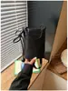 Bolsa de Teléfono Tejida Súper Caliente de Verano para Mujer 2026 Nueva Casual Ligera de un Solo Hombro para Viajes Diarios Bolso Cruzado Simple Versátil