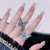 Anillo abierto de mariposa tridimensional irregular, diseño de nicho femenino, anillo de dedo dietético ajustable, anillo de viento frío