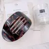 Grampo de Cabelo Redondo Plano Terra Transparente Estampa de Leopardo Transfronteiriço com Forte Fixação e Dentes Confortáveis Design Curvo Prendedor Atacado