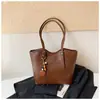 Bolsa de ombro minimalista e casual estilo coreano para mulheres, nova coleção 2026, apresentando uma textura de alta qualidade, um design único e grande capacidade
