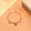 Pulseira Saco da Sorte Fio Vermelho para o Ano de Nascimento, Atraindo Riqueza e Boa Sorte, com Moedas de Cobre, Luxo Leve, Sensação de Alto Padrão, Exquisita, Moderna, Versátil e Pulseira Personalizada
