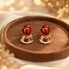 Aretes Geométricos Rojos Ankela Festivos de Año Nuevo Nicho Temperamento Venta Caliente Aretes de Botón Otoño/Invierno 2026 Venta al por Mayor de Pendientes