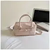 Bolso de Mano Pequeño Cuadrado de Color Sólido Elegante y Único Estilo Coreano para Mujer Verano 2026 Nuevo Bolso de Hombro Simple Bolso Cruzado para Viajes