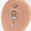 Clavo para ombligo con forma de corazón de circón incrustado en cobre, alas de amor, colgante de gota de agua, aro para ombligo, joyería de perforación transfronteriza Europa y Estados Unidos venta al por mayor