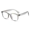 Nuevas gafas fotocromáticas estilo coreano para hombre con remaches, montura redonda pequeña retro, bloqueo de luz azul, sencillas y elegantes