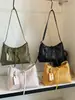Bolso tote texturizado de lujo de alta gama transfronterizo para mujer, nuevo modelo 2026, bolso casual de gran capacidad para el día a día, de hombro y cruzado