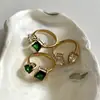 Anillo Dazan al por mayor en stock de Acero de Titanio con Galvanizado de Oro Real 18K, Cuadrado de Gota de Agua Abierto con Circonita, Transfronterizo Europeo y Americano Ins