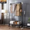 Perchero de pie para dormitorios, simple y fácil de usar, con un diseño reforzado, adecuado para colgar ropa y sombreros, y se puede mover al balcón para secar la ropa