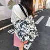 Bolsa de Lona para Mulheres 2024 Nova Bolsa de Ombro para Estudantes Bolsa Tutorial Bolsa de Mão Bolsa de Mão de Grande Capacidade Entrega de Peça Única