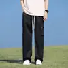 Pantalones casuales para hombre primavera y otoño nueva marca de moda talla grande holgados overoles americanos para hombre pantalones de cintura elástica combinan con todo