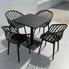 Juego pequeño de mesa y sillas redondas de acero al carbono simple para ocio en balcón, mesa de discusión, área de descanso, mesa de comedor para cafetería de té con leche al aire libre