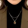 Collar apilado con colgante de ámbar color vino tinto para mujer, cadena de sudor de lujo ligero de alta gama, nicho, accesorios elegantes