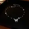 Hilo de pescar Colgante de mariposa de perla sintética collar cadena corta de clavícula de moda nuevo collar de lujo ligero accesorios