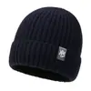 Gorro de punto liso para otoño e invierno para hombres y mujeres, gorro de lana grueso y cálido, gorro versátil con borde enrollado, gorro de punto para exteriores