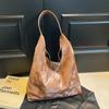 Bolsa grande simples feminina 2025 nova bolsa tote de primavera moderna para todos os gostos bolsa de ombro única de nicho de grande capacidade feminina