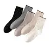 Calcetines largos a rayas y de lunares, modernos, dulces y lindos, para estudiantes, estilo coreano, perfectos para otoño e invierno, con etiqueta de tela y longitud hasta la mitad de la pantorrilla.