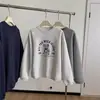 Moletom Redondo com Estampa de Desenho Estilo Coreano Outono/Inverno 2025 para Mulheres, Novo Estilo Preguiçoso Bf Caimento Solto, Forrado com Fleece e Espessado, Blusa da Moda