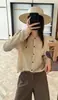 Han Xun Cardigan de Punto Holgado con Cuello Redondo, Malla Hueca Semitransparente, Elegante y de Lujo Casual para Mujer, Modelo Nuevo Otoño 2026 27172