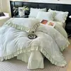 Juego de ropa de cama de cuatro piezas de terciopelo de leche de alta densidad con relieve 2026, con sábanas de franela espesas y cálidas, funda de edredón y sábana bajera acolchada antideslizante