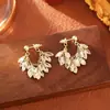 Populares Aretes de Borla con Circonita en Forma de Hoja con un Ambiente Súper de Hada, de Alta Gama, Lujo Ligero y de Moda, Adecuados para Mujeres con Rostros Cuadrados o Redondos