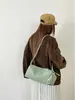 Colección de otoño transfronteriza nueva: Mochila de color sólido, minimalista y portátil para actividades al aire libre, ocio, ciclismo, deportes y viajes ligeros - diseñada para mujeres