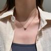 Collar de perlas retro francés para mujer, cadena de clavícula ligera de lujo con diseño de nicho, estilo popular 2025.