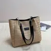 Bolsa de mano de gran capacidad bolsa de paja para vacaciones estilo nuevo nicho bolsa de hombro para el trabajo de moda verano playa costa mujeres