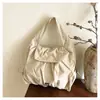 Nueva Bolsa de Lona 2026 Gran Capacidad Portátil para Mujer Simple para el Trabajo Bajo el Brazo Bolso de Hombro con Diseño de Nicho de Moda