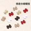 Joyería de uñas con lazo rojo mini roja en línea japonesa al por mayor diy punta del dedo aleación pequeños accesorios decoración de uñas