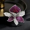 Nuevo diseño de estilo europeo elegante elegante elegante lujo circonio completo industria pesada orquídea broche de abrigo anti-exposición entrega de una sola pieza