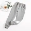 Calça Jogger Masculina Primavera e Outono Crianças Algodão Saudável Calça Jogger Bebê Calças Casuais Crianças Tamanho Médio e Grande Calças de Uniforme Escolar Crianças Ensino Fundamental