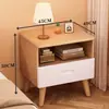 Mesita de noche de madera maciza para dormitorio del hogar 2026 Venta caliente Creativa Pequeño Armario de almacenamiento simple para niños Mesita de noche de tronco