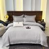 Conjunto de quatro peças de cama de hotel Pano de estilo homestay Branco puro Roupa de cama de cetim Lençol de cama Capa de colcha Conjunto de três peças