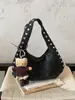 Bolsas para mujer, bolsas para mujer de comercio exterior, bolsos vintage marrones de hombro y axila, bolsos de remaches de alta gama, transfronterizo