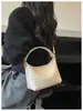 Bolsas de Tecido de Nicho Super Quentes para Mulheres 2026 Novo Estilo Versátil para o Dia a Dia Bolsa de Ombro Único para Sobrancelha Pequena Bolsa de Mão para Sair Bolsa Dumpling